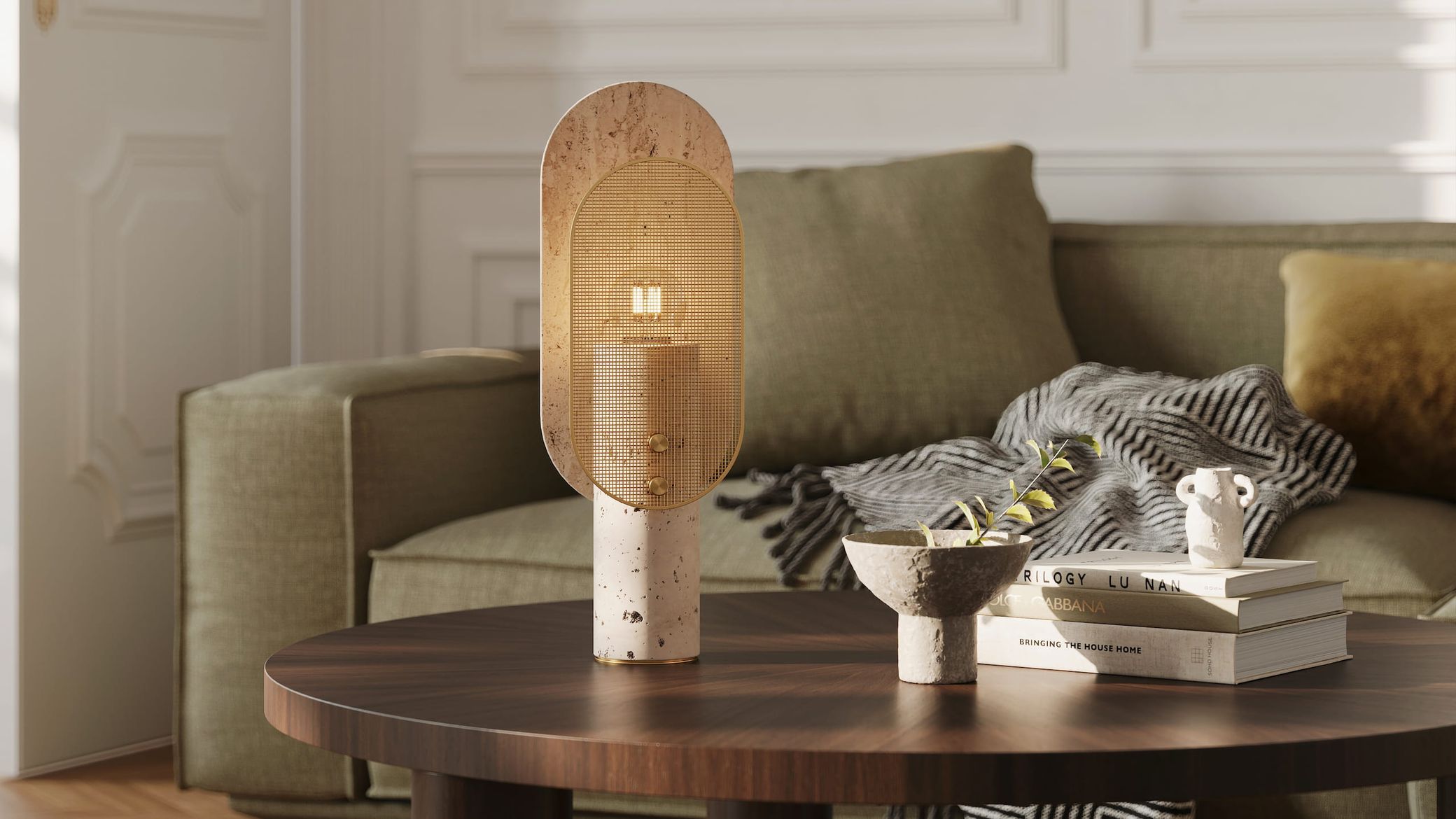 Modern table lamp with perforated brass mesh shade and textured stone base displaying photorealistic 3D rendered lighting effects. Contemporary interior scene featuring warm ambient glow, olive green sofa, decorative concrete planter, and lifestyle accessories. Demonstration of high-end lighting fixture visualization with detailed material textures and subtle light reflections.