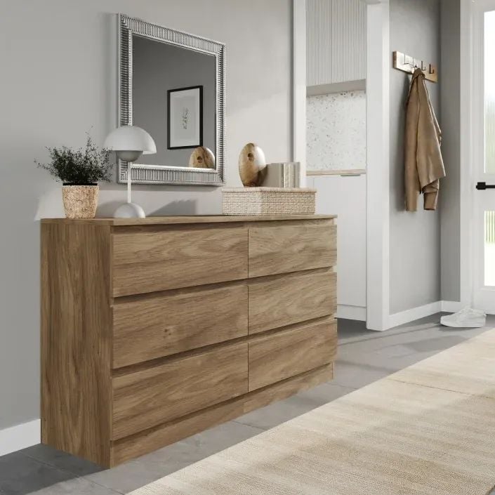 3D visualization of a natural wood chest of drawers in a hallway with mirror, lamp, and decor item