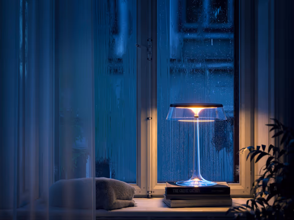 Photorealistic 3D rendering of a stylish lamp on a windowsill, showcasing 3D product modeling and visualization in a cozy interior setting.