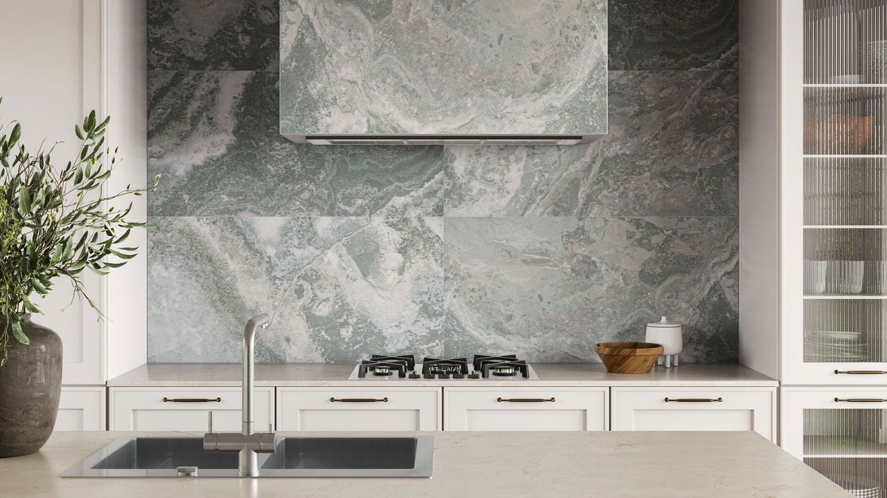 Photorealistic 3D rendering of marble vinyl tile used as a kitchen backsplash with white cabinetry