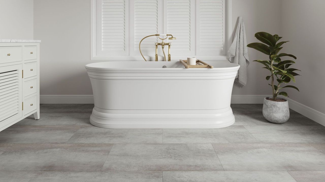 Photorealistic product rendering of large-format stone-look tile flooring in a classic bathroom with a freestanding tub
