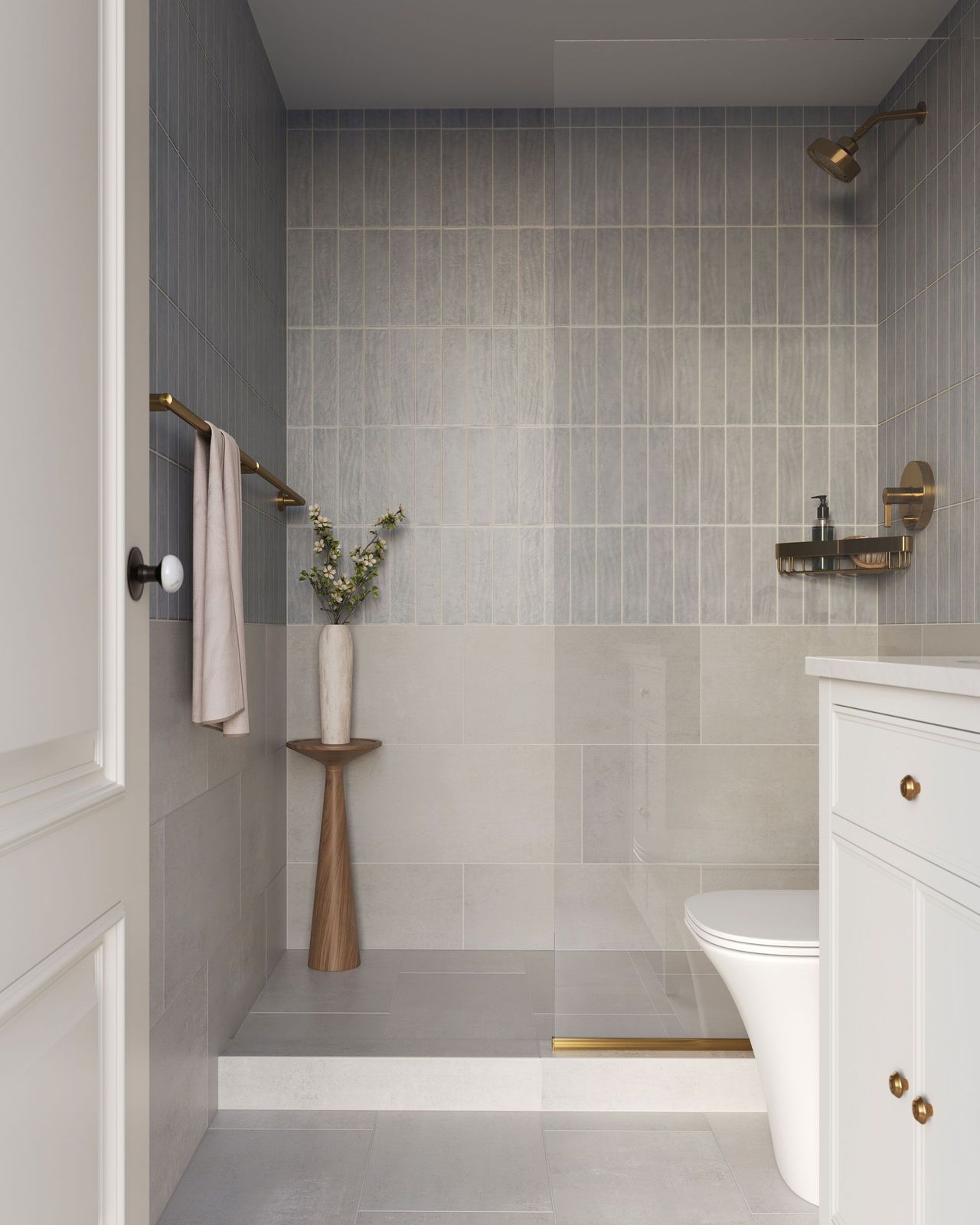 3D Visualization for tiles showing a modern bathroom with vertical two-tone neutral tiles in beige and greige shades, brass fixtures, and a wall-mounted toilet